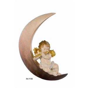 Putto on the moon with flute