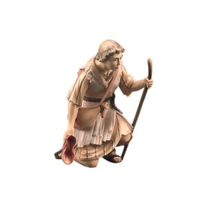 Shepherd kneeling with walking-stick