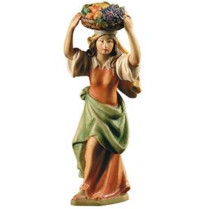 Donna con cesto di frutta
