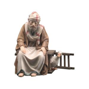 Pastore seduto senza gabbia