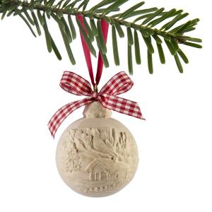 Christmas boul in swiss pine with mountain hut