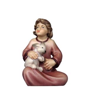 Mädchen sitzend mit Hase
