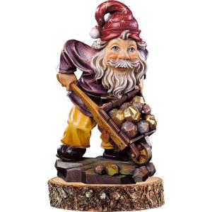 Gnome gold-digger on pedestal