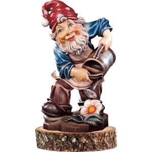 Gnome gardener on pedestal