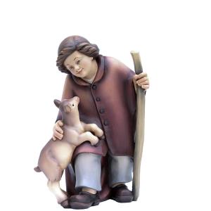 Shepherd boy with goat